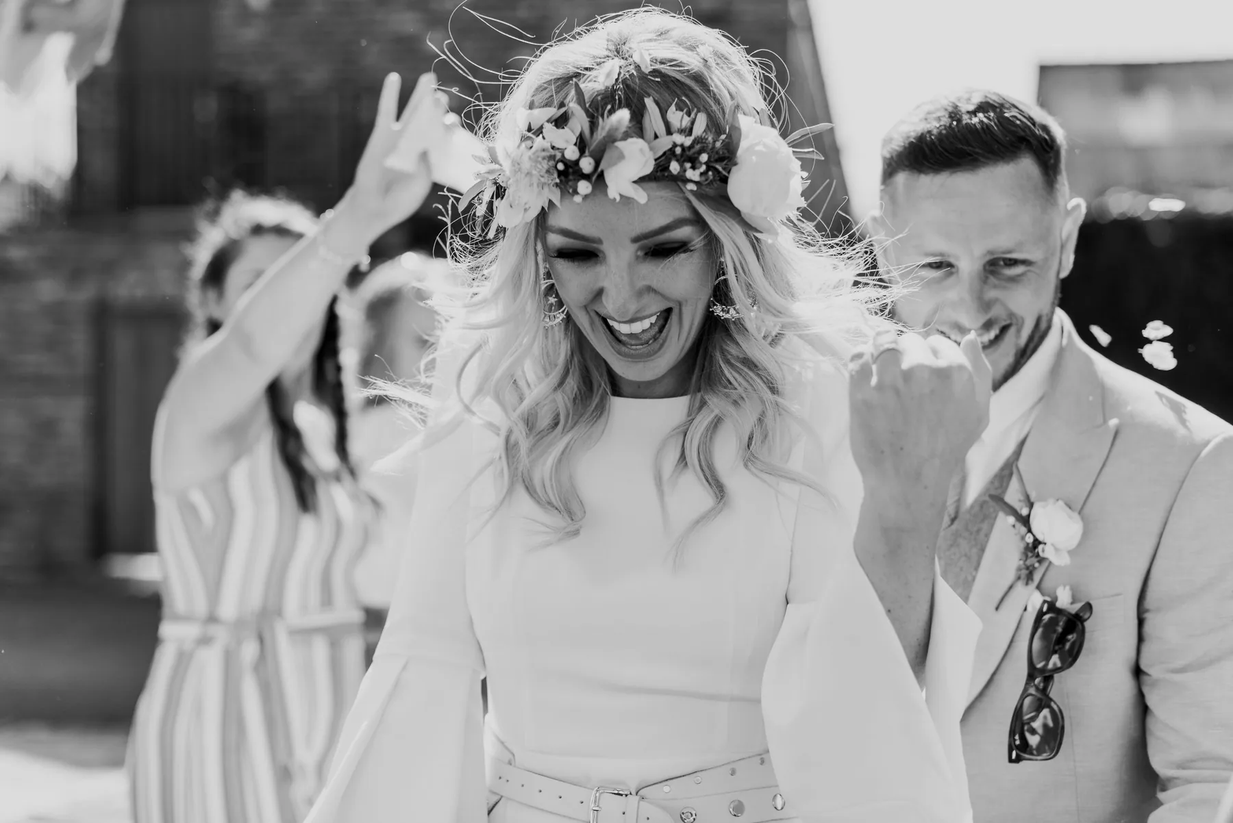 Kate smiling beneath her flower crown