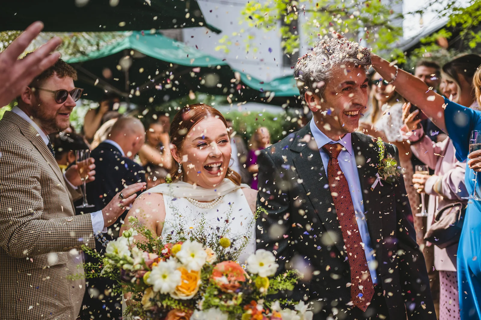 Andrew and Emily celebrating their wedding