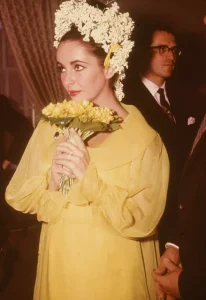 Elizabeth Taylor in her yellow wedding dress